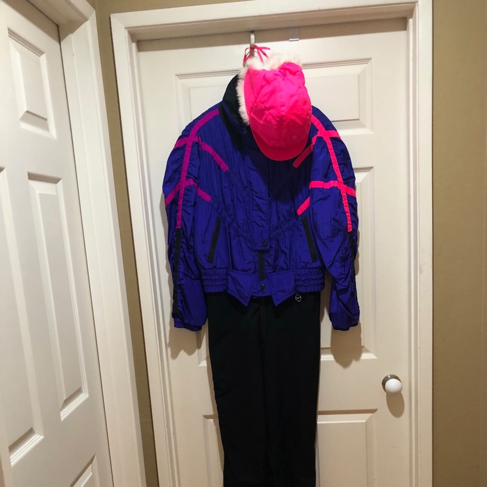Obermeyer one piece ski outfit with fur-lined hat